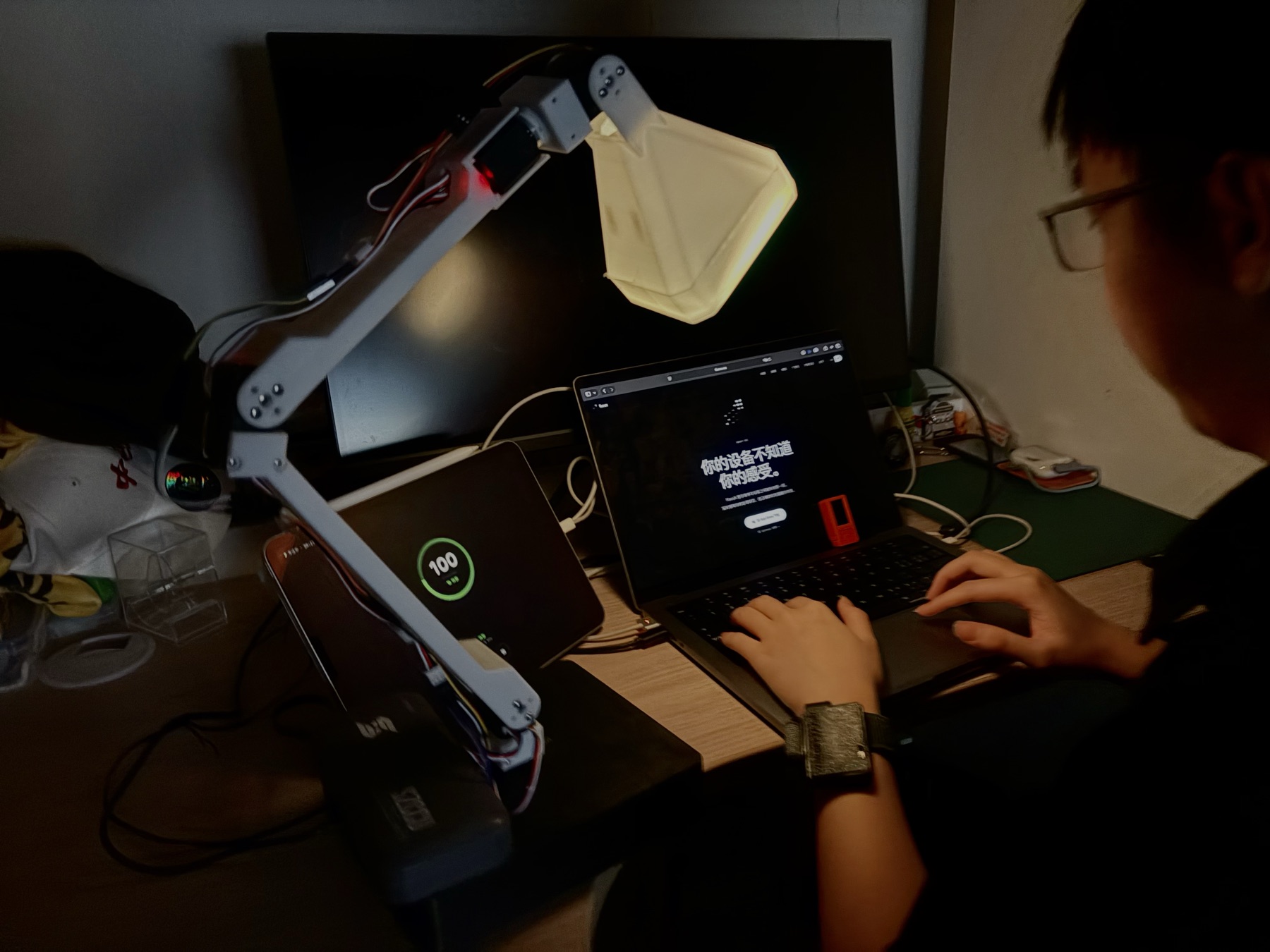 FocuX wearable, iPhone interface, dashboard and LeLamp system in use